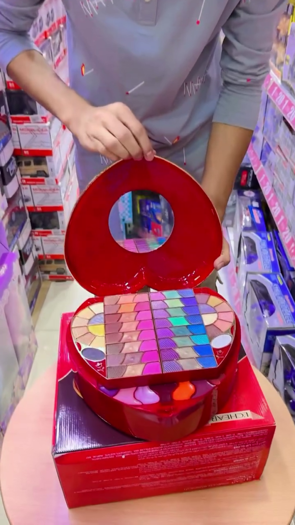 All-in-One Professional Makeup Kit with Mirror, Foldable Multi-Layer Storage, Vibrant Eyeshadow Palette, Lip Colors, Blush, Highlighter, Compact Powders, and Essential Applicators in Stylish Red Box Design