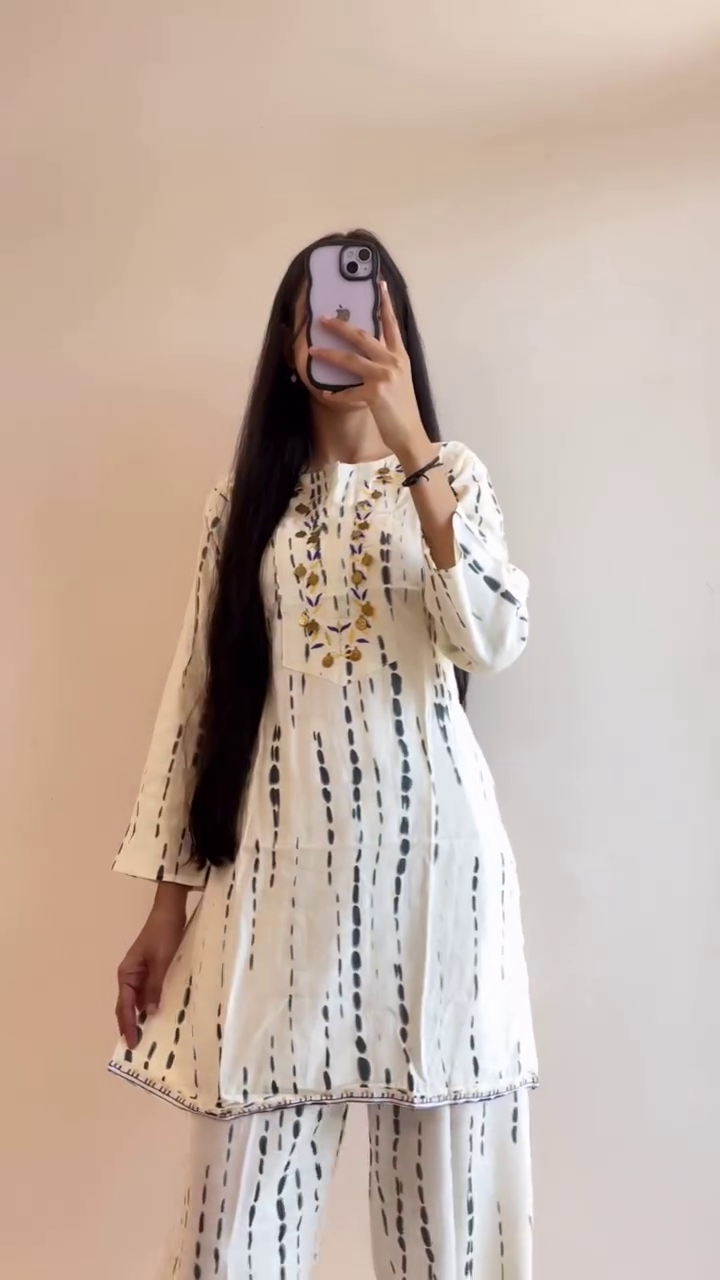 Pastel Yellow Net Lehenga with Sequins and Floral Embroidery - Image 2